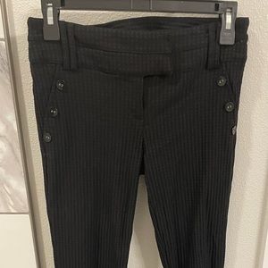 Black low rise, wide leg patterned pants